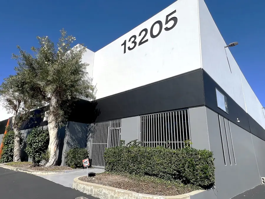 Exterior of CRIDA's Gardena, California facility, with the building's street address visible